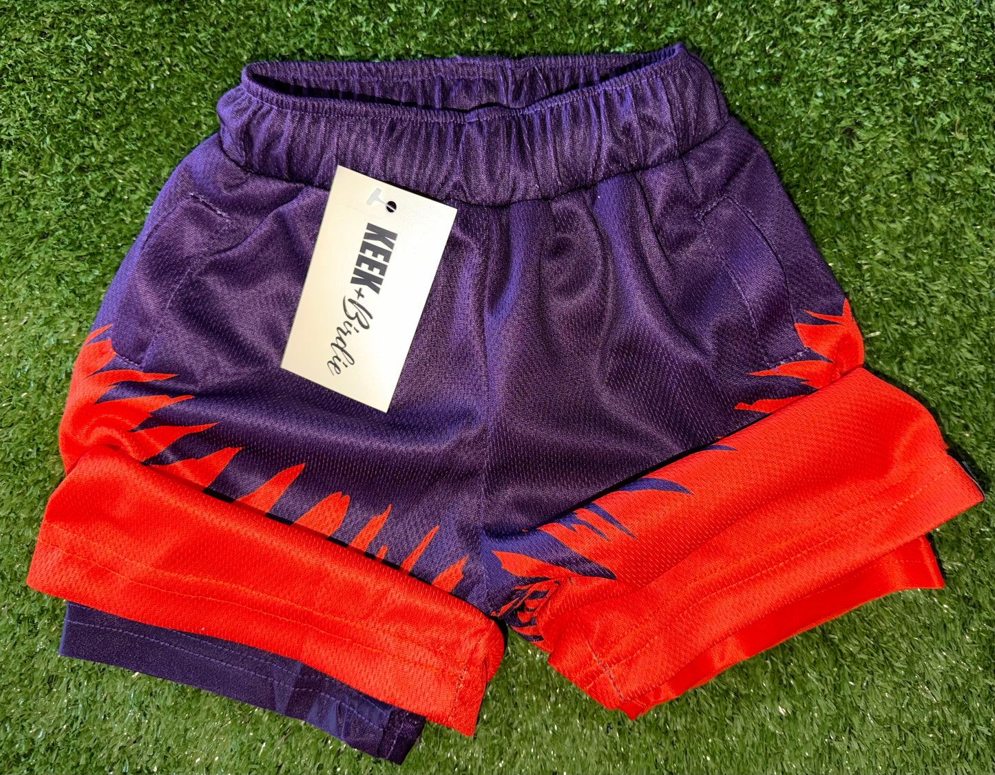 KB shorts orange/purple spikes