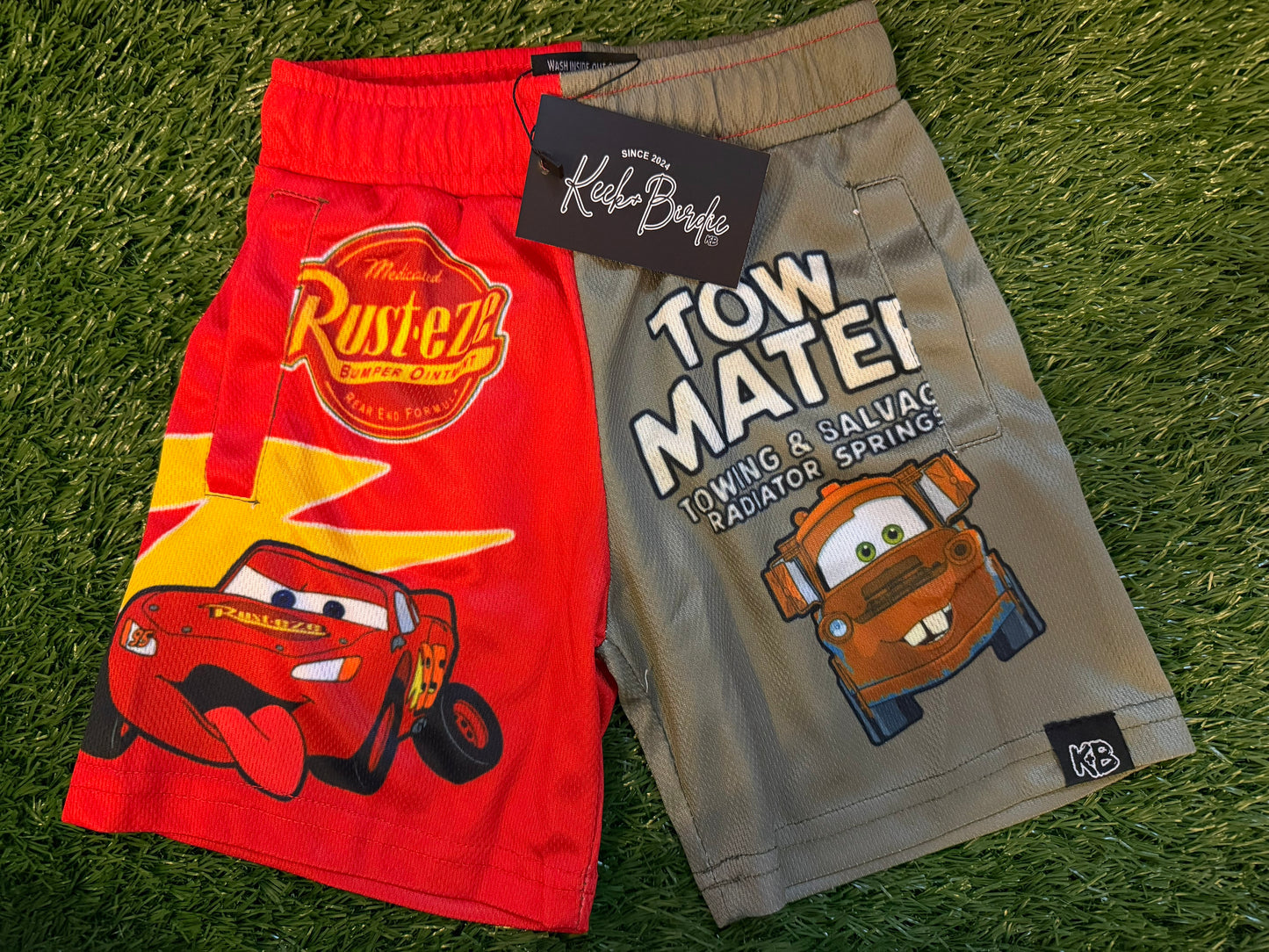 KB red car/brown tow truck